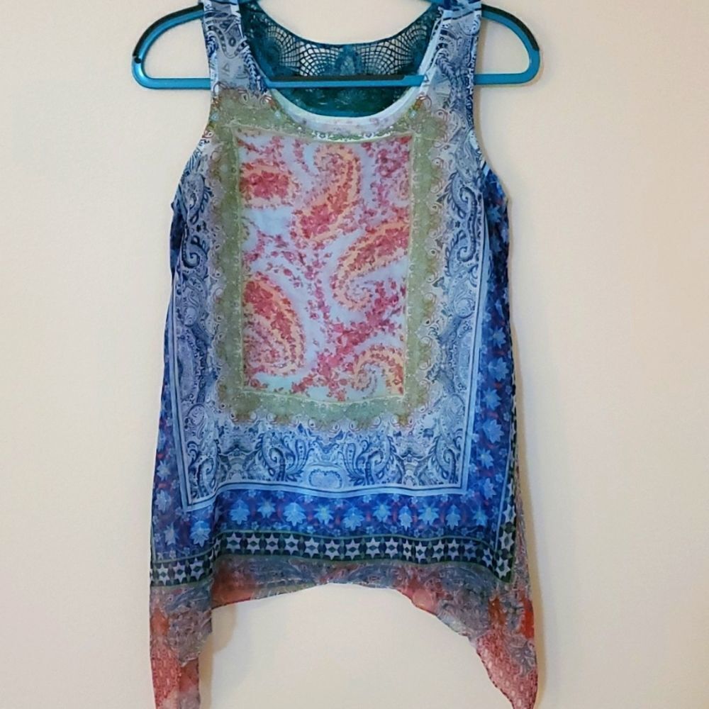 Live and let live women's top. Size small. Beautiful colors great flowing fabric